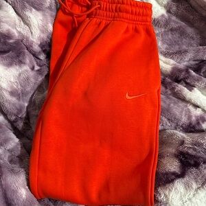 Nike woman’s Bright Orange Joggers